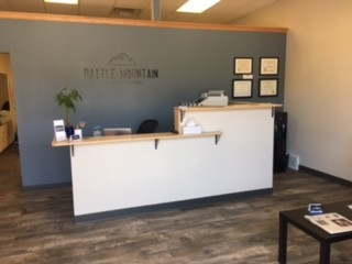 Reception desk and waiting area inside the clinic